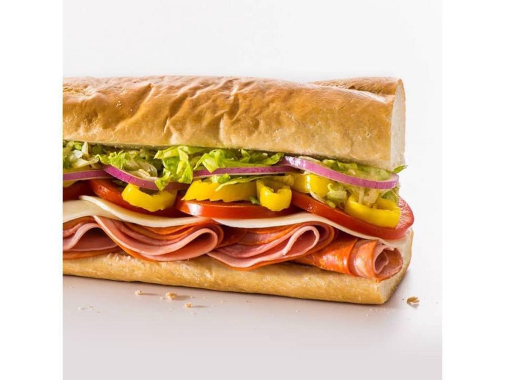 Italian (Small) · Pepperoni, Capicola, Genoa Salami, Mortadella & Provolone Cheese, topped with Lettuce, Tomato, Banana Peppers, Red Onions, Oil & Vinegar. Your choice of fresh garnishes can be added.