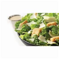 Caesar Salad · Crisp Romaine Lettuce, shredded Parmesan Cheese, Home-Style Croutons and our Creamy Caesar D...