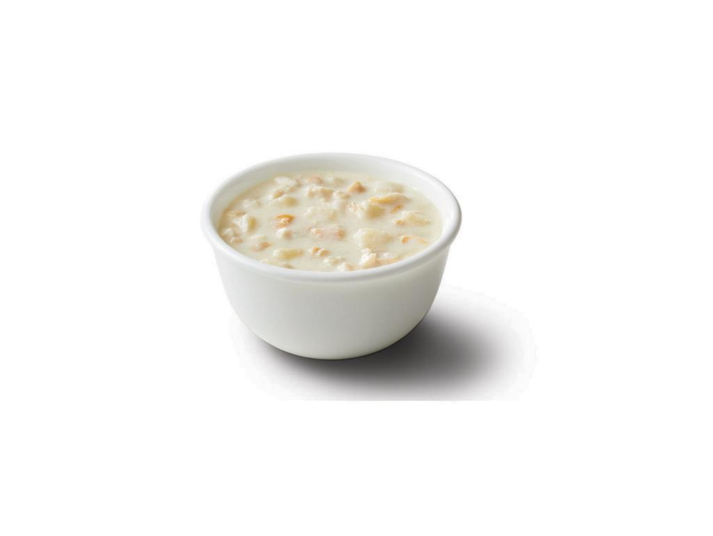 New England Clam Chowder · Authentic New England Clam Chowder, thick and rich, made with sweet cream and flavorful clam broth, loaded with tender chunks of clams, potatoes, and spices.