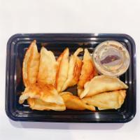  Gyoza ( 10 )  · 10 pcs of chicken and vegetable pot stickers. 