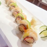 Ichi Roll · Crab salad, cucumber inside, avocado and shrimp on the top.