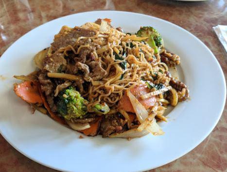 Spicy Noodle (1 Star Minimum) · Meat or tofu is stir-fried with ramen egg noodles, egg, bamboo shoots, chili sauce, onion, broccoli, carrot, Thai sweet basil, and home-made sauce.