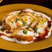 Dahi Bhalla Chaat · Deed fried lentil balls drenched in creamy yogurt and topped with sweet and spicy chutneys