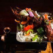 Adrak ke Panje (Lamb Chops) · Lamb chops marinated overnight in cumin-coriander paster, cooked in the tandoor oven, and se...