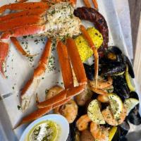 Boil Feast · 1 lb. Crab legs, 1 lb. Shrimp, 1 lb. Mussels, sausages, Corn & Potato