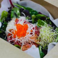 Sashimi Salad Bowl (with Rice and Korean spicy sweet sauce)  · This is a bowl of rice with fresh assorted raw fish and vegetables. Seasoned Korean spicy sa...