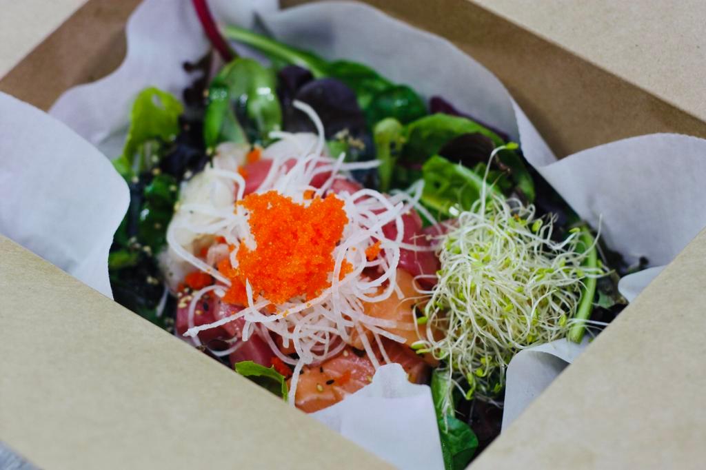 Sashimi Salad Bowl (with Rice and Korean spicy sweet sauce)  · This is a bowl of rice with fresh assorted raw fish and vegetables. Seasoned Korean spicy sauce (Sweet and sour red chili paste ) is served along with it. Similar to bibimbap