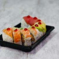 Spicy Rainbow Roll · Inside stuffed with spicy crab, avocado, and cucumber. Outside salmon, tuna, snapper, and sh...