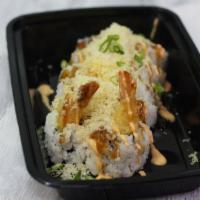 Golden Shrimp Roll · Inside shrimp tempura, crab, and avocado. Outside tempura crunch.