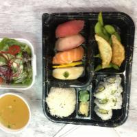 Sushi Bento · All bento boxes served with miso soup, salad, and rice and Cali roll.
