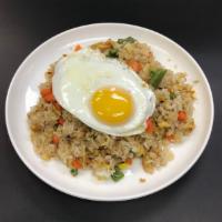 14. Pork Bokeum Bap · Stir fried rice with pork, mixed vegetables and special sauce.