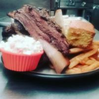 Half Rack Beef Ribs · Its 2 bones Served with 2 sides, a honey corn bread muffin and a drink.