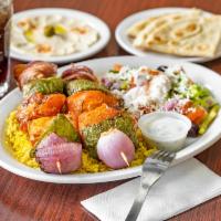 Veggie Kabob Plate · 2 skewers of freshly grill tomatoes, onions, green peppers, and mushrooms. Served with basma...