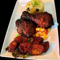 Caribana Jerk Chicken · Marinated and grilled thighs and leg pieces, mango salsa and choice of 2 side items.