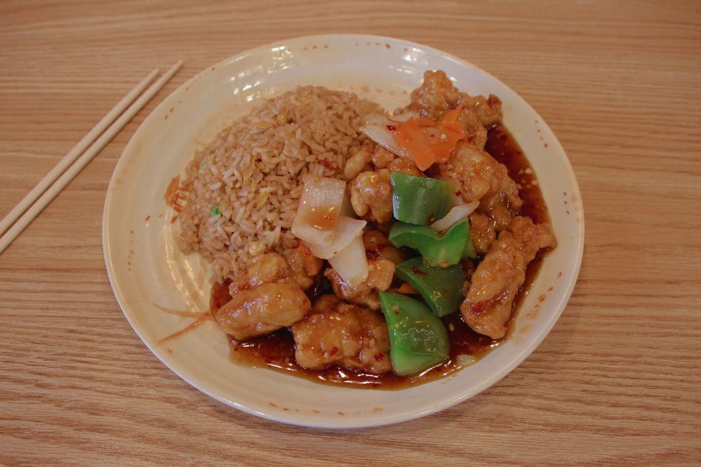 General Tso's Chicken · Batter fried chicken, onions, carrots and green peppers in a mildly spicy sauce served with rice. Spicy.