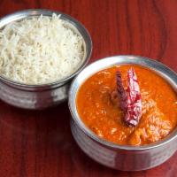 Chicken Vindaloo · Fiery sauce, sun dried Kashmiri red chili, potato and tamarind. Served with basmati rice. Ve...