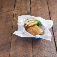 Turkeycado Cold Sandwich · Turkey, avocado, red onions, lettuce and tomato on a soft roll.