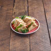 Deli Club Cold Sandwich · Turkey, ham, bacon, American and Swiss cheese, lettuce, tomato on sliced wheat.