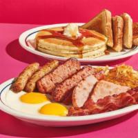 Big Farmhouse BreakFEAST™ · Get four types of meat, including 2 smoked sausage links, 2 strips of hickory-smoked bacon, ...