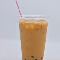 Thai /Milk Tea with Boba 24oz · Freshly brewed Iced Thai tea and Milk tea mix with Boba