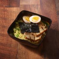 Tonkotsu Ramen · Pork broth soup base, ramen noodle, chashu pork, memma bamboo, seasoned boiled egg, green on...