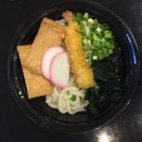 Okame Udon · Hot soup udon noodle with shrimp tempura, tofu curd, green onion wakame seaweed and fish cake.