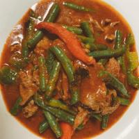 Pad Prik Khing · Choice of protein stir fried with string bean and bell peppers in special red curry paste.