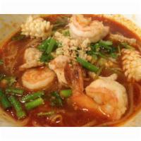 Tom Yum Noodle Soup · Choice of protein with thin rice noodle in Thai spicy lemongrass soup. 