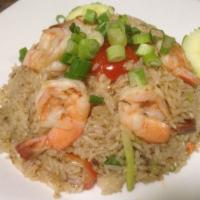 Thai Fried Rice · Choice of protein stir fried with steamed white rice in Thai soy sauce, egg, onion, carrot, ...