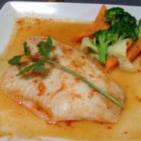 Pla Nueng Ma Now · Filet tilapia, steamed with lime chili garlic sauce served with steamed vegetables.