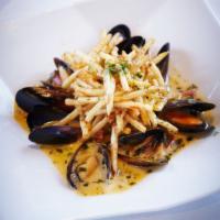 Blue Lip Mussels · Tomato, leek, fine herbs and white wine in a light cream broth, thyme paprika french fries. ...