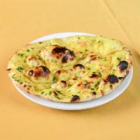 Garlic Tandoori Naan · Our tandoori naan flavoured with a special garlic blend.