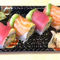 Rainbow Roll · Crab stick, avocado, cucumber topped with assorted fish. 