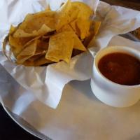Chips and Salsa  · Oven-roasted salsa served with fresh tortilla chips. Add guacamole for an additional charge.