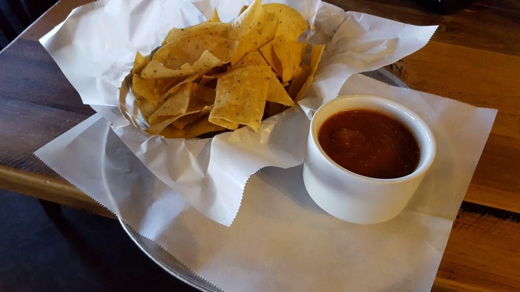 Chips and Salsa  · Oven-roasted salsa served with fresh tortilla chips. Add guacamole for an additional charge.