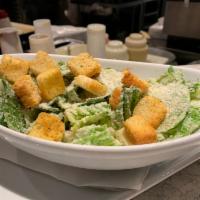 Caesar Salad  · Mix of romaine and spring lettuce, house-made croutons, Parmesan cheese, Caesar dressing.