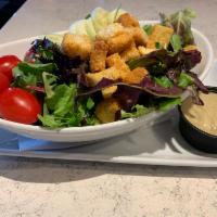 House Salad  · Mix of romaine and spring lettuce, tomatoes, cucumbers, red onion, and house-made croutons. ...
