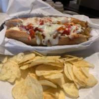 Sausage Sub · Sliced Italian link sausage, roasted red bell peppers and onions, warm marinara sauce, and o...