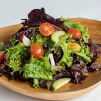 House Salad · Lettuce mix, cherry tomatoes, cucumbers, radishes, chef’s special dressing.
