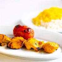 Chicken Kabob · Lemon and saffron marinated tender chicken breast, grilled on the flame.