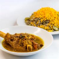 Lamb Shank  · Served with baghali polo. Slow cooked lamb shank with baghali polo (rice, dill and lima bean...