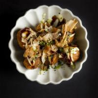 Takoyaki Plate · Octopus puffs mixed with green onions. Topped with takoyaki sauce, ponzu aioli, and bonito f...