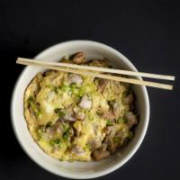 Oyakodon · Spring chicken, sliced onions, green onions and egg simmered in a special sauce, served over...