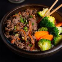 Bulgogi Beef Bowl · Thinly sliced beef marinated in Korean bulgogi sauce, sauteed with onions, carrots served ov...