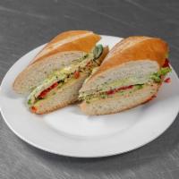 016. The Veggie Sandwich · Sprouts, avocado, dill pickled havarti cheese, roasted red pepper, cucumber, hummus and pest...