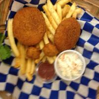 2 Piece Fried Crab Cake Basket · complete With : Fries, Coleslaw & Hushpuppies 