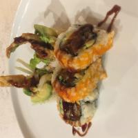 Spider  Roll · 5 pieces. Softshell crab tempura, cucumber, avocado fish roe.