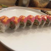 Manhattan Roll · 8 pieces. Salmon tempura, avocado, cucumber top with fresh tuna and spicy mayo.