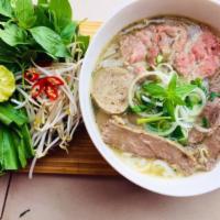House special pho · Combine of rare steak, brisket, meatball and tendon