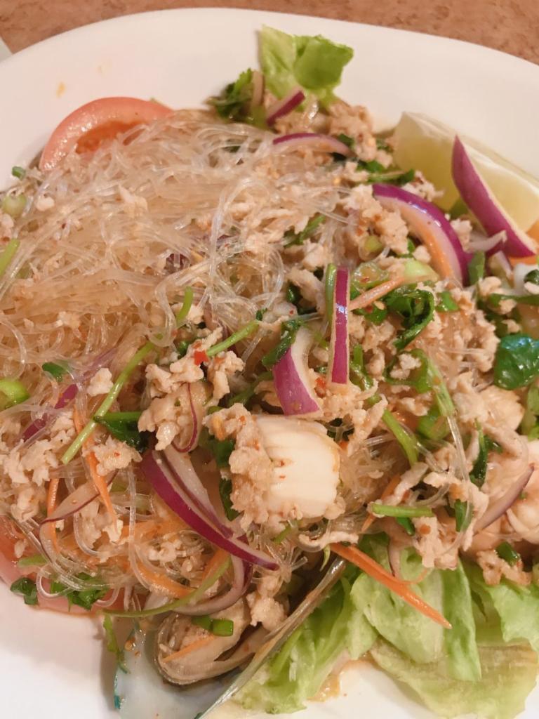 Yum Woon Sen Salad · Glass noodle, ground chicken, prawn, calamari, chili, red, green onion, cilantro, tomato and lime juice.